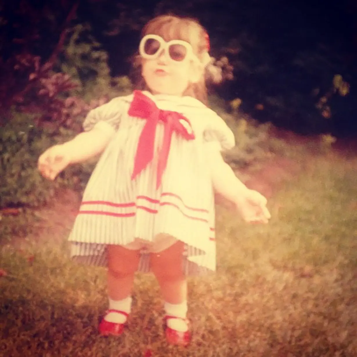 From a young age, I embraced my identity as a Fourth of July Baby. This photo wasn't taken on my birthday, but I was still rocking a patriotic look.