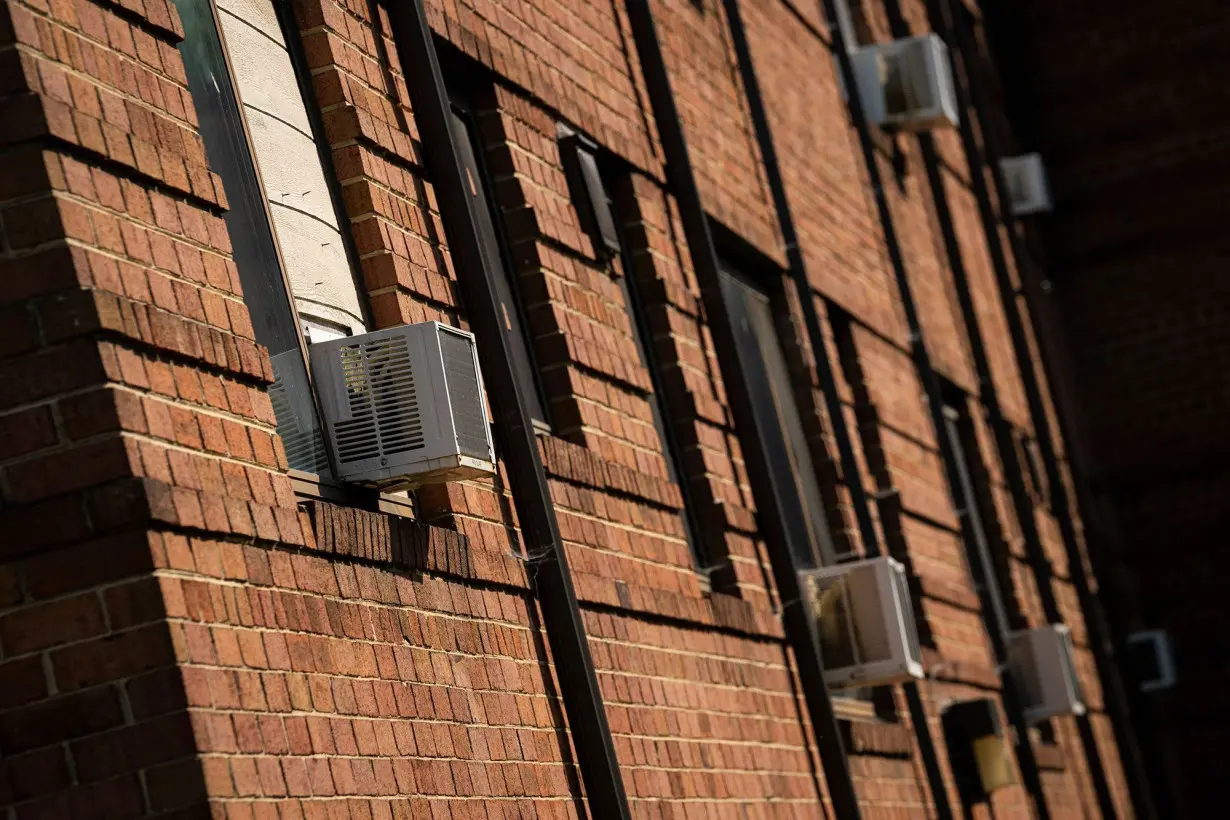 Air conditioning units installed in windows at an apartment complex in Hyattsville, Maryland, on June 17.