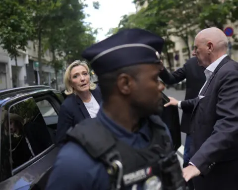 France's government spokesperson is attacked on the campaign trail, days before decisive election