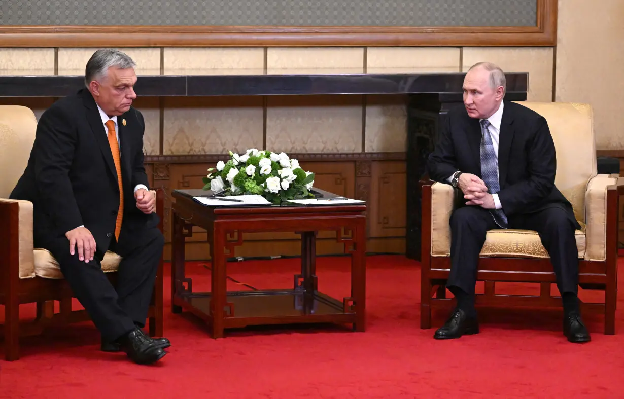 Russian President Putin and Hungarian Prime Minister Orban meet in Beijing