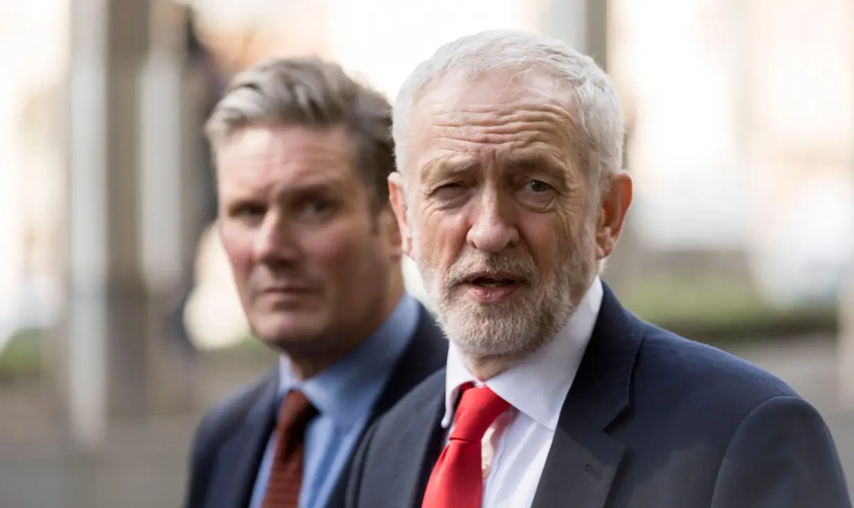 Starmer, left, and then-Labour leader Jeremy Corbyn talk to the media at the EU Commission headquarters on March 21, 2019 in Brussels, Belgium.