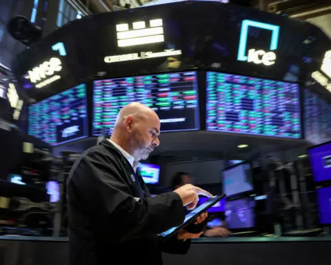 Nasdaq, S&P 500 hit record highs as payrolls data raises rate cut hopes