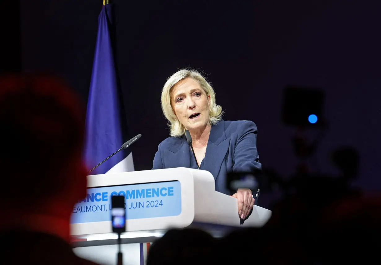 Le Pen promises French far-right will rein in aid to Ukraine, slams soccer star Mbappé