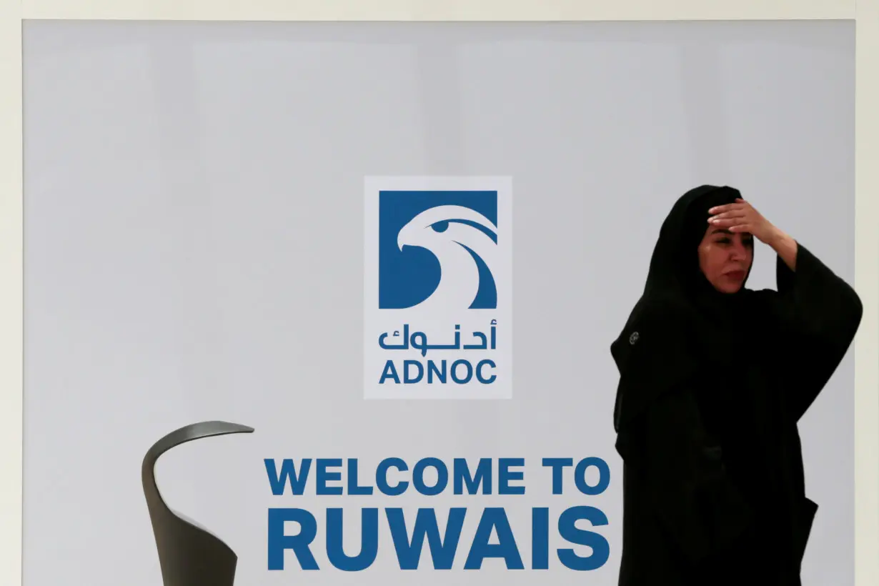 FILE PHOTO: An Emirati woman arrives to ADNOC's Yash Social Center in Ruwais