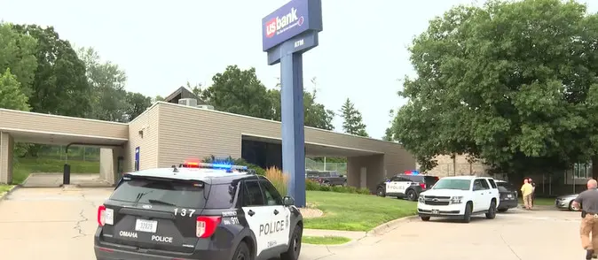 'The place was filled with cops': Witness sees bank robbery victim in zip ties, describes scene