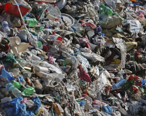 Mount Everest's highest camp is littered with frozen garbage, and cleanup is likely to take years