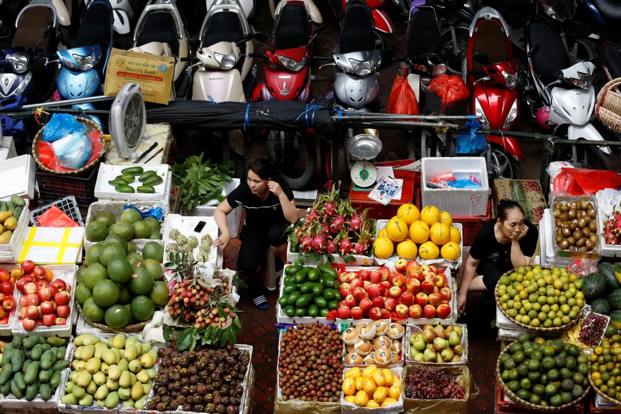 Vendors are seen at the Hom Market in Hanoi, Vietnam