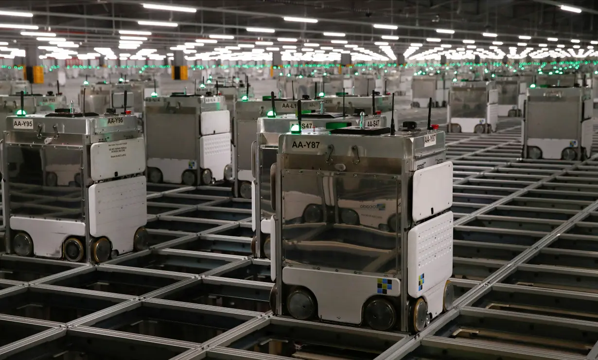 FILE PHOTO: Ocado robots are seen inside a warehouse in Erith