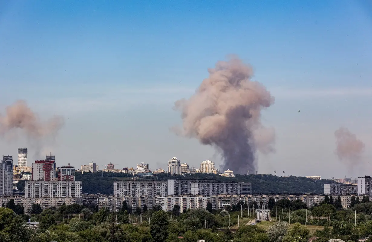 Smoke rises in the sky over the city after a Russian missile strike in Kyiv