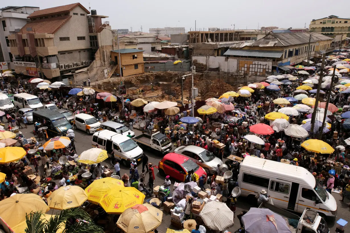 FILE PHOTO: FILE PHOTO: People make trade in Accra