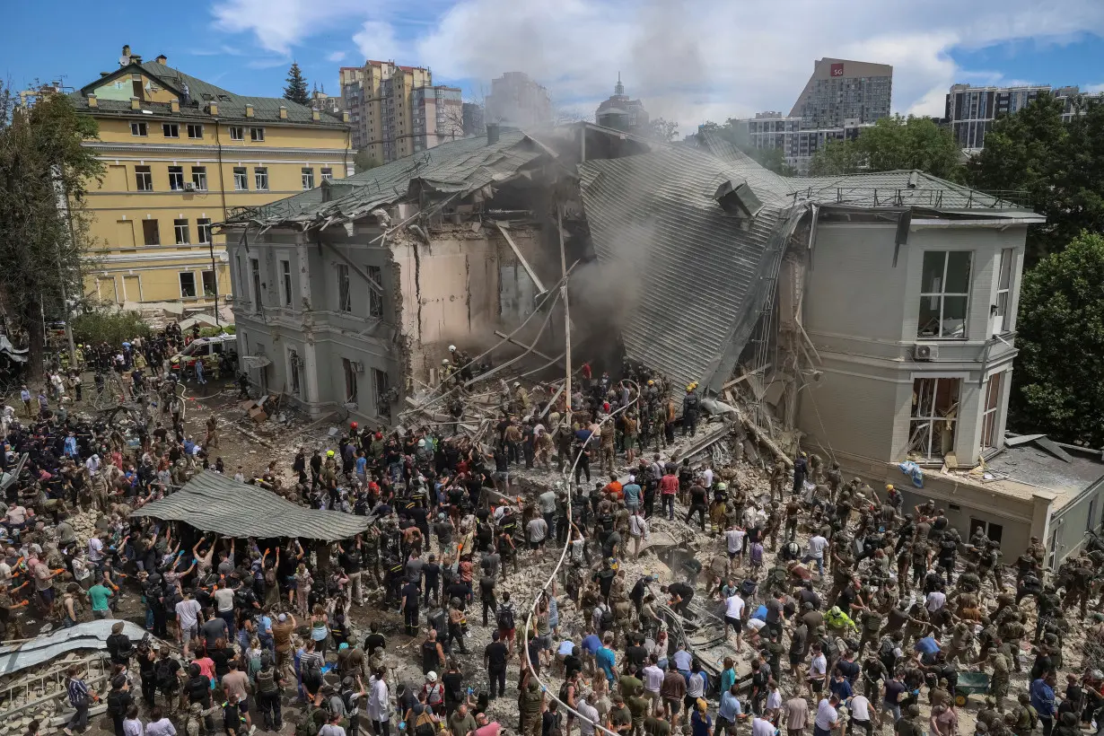 Rescuers work at Ohmatdyt Children's Hospital that was damaged during Russian missile strikes, in Kyiv