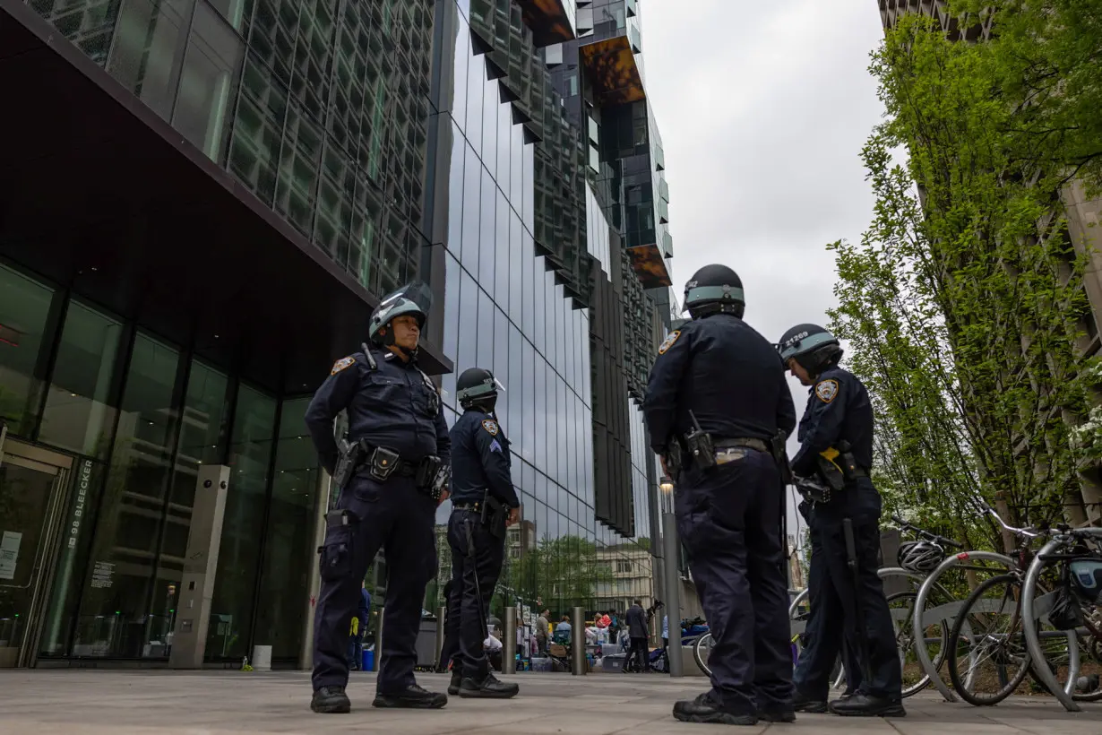 Police stand guard at the NYU campus, after students and pro-Palestinian supporters were removed after days of encampment, in New York