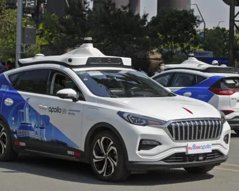 A driverless car hits a person crossing against the light in China