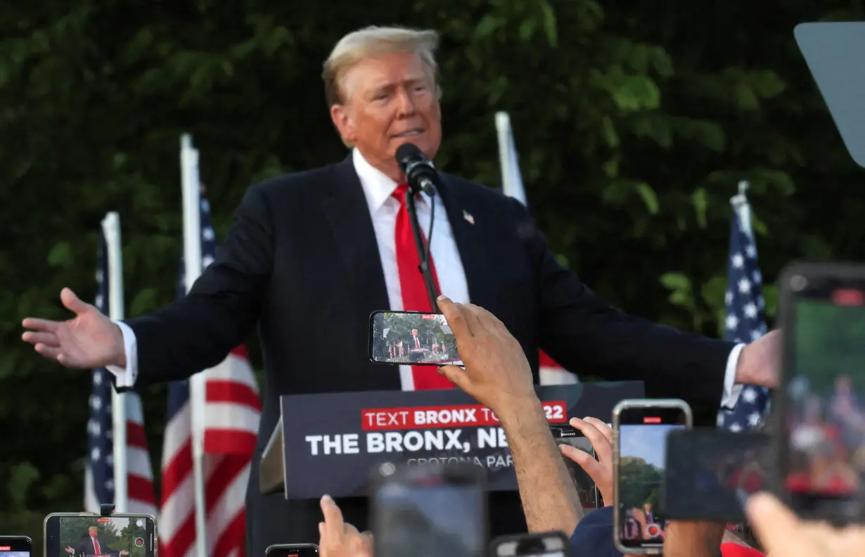 FILE PHOTO: Former U.S. President and Republican presidential candidate Trump attends a campaign rally, in New York