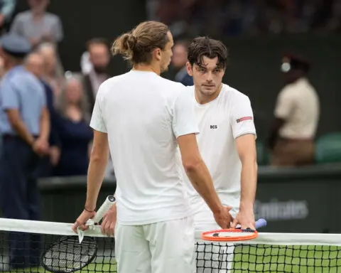 American Taylor Fritz rallies from two sets down to beat world No. 4 Alex Zverev before post-match exchange at net