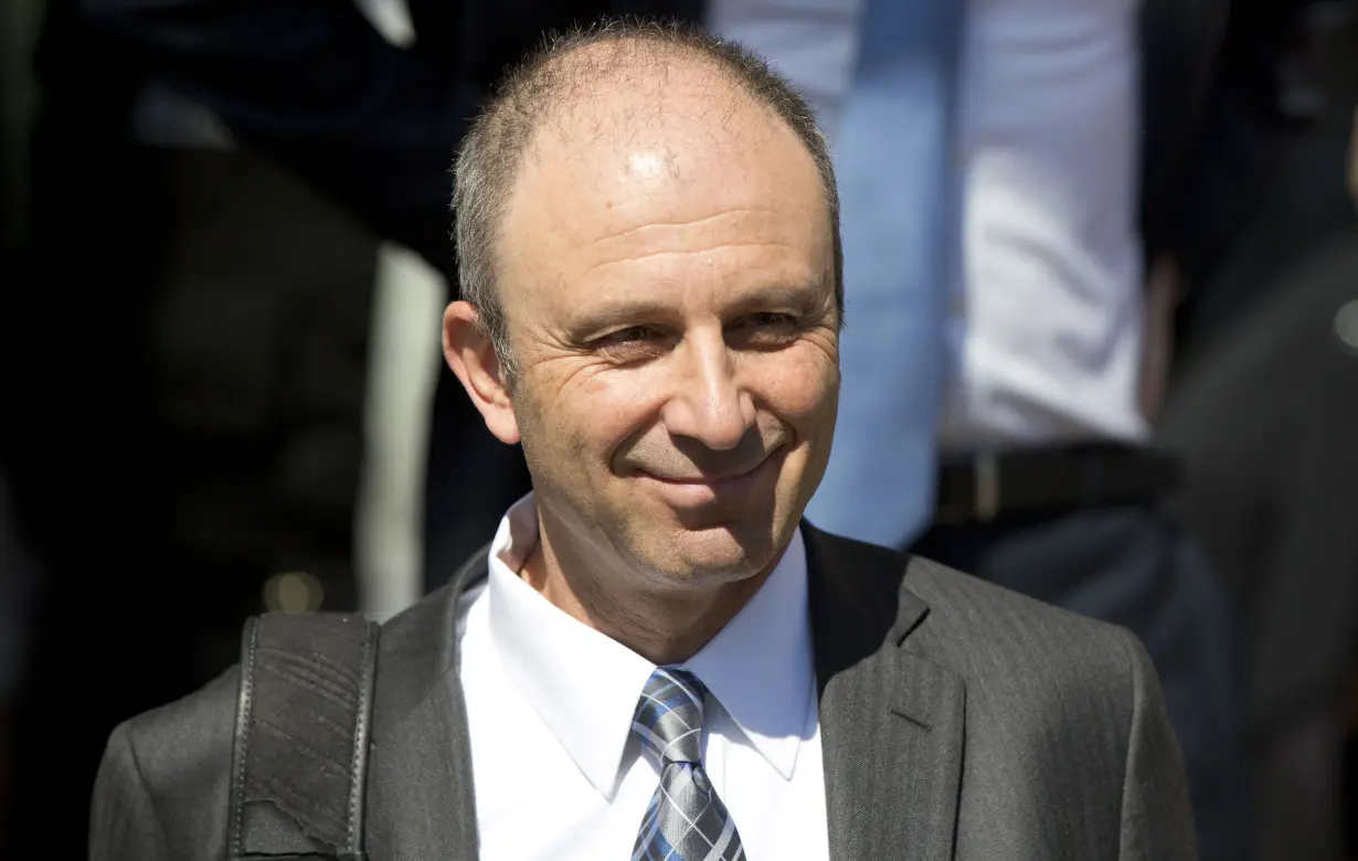 Pfizer worldwide research and development president Mikael Dolsten leaves after appearing at a commons science committee hearing at Portcullis House in London