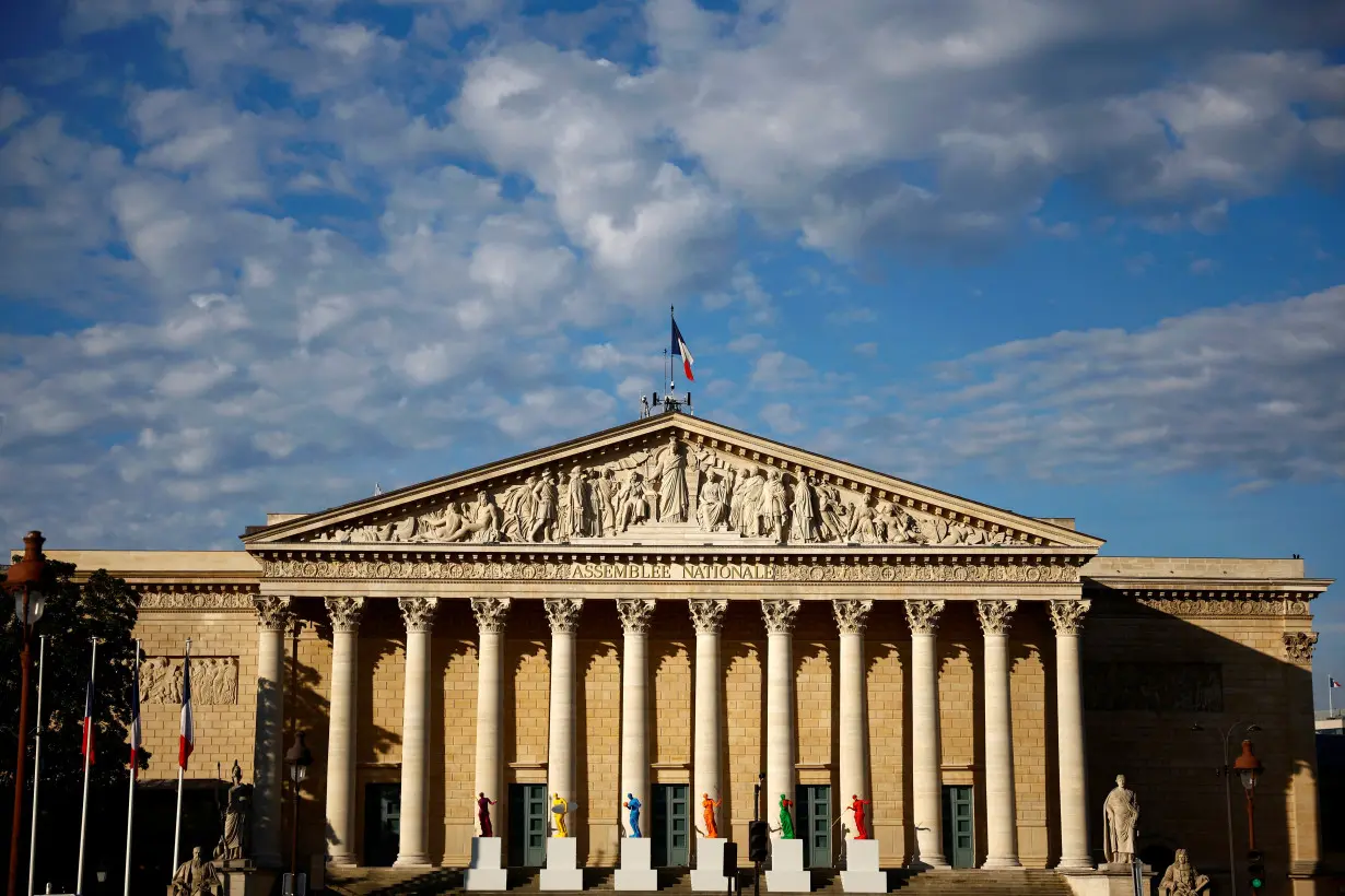 Newly-elected lawmakers make entry to the National Assembly in Paris