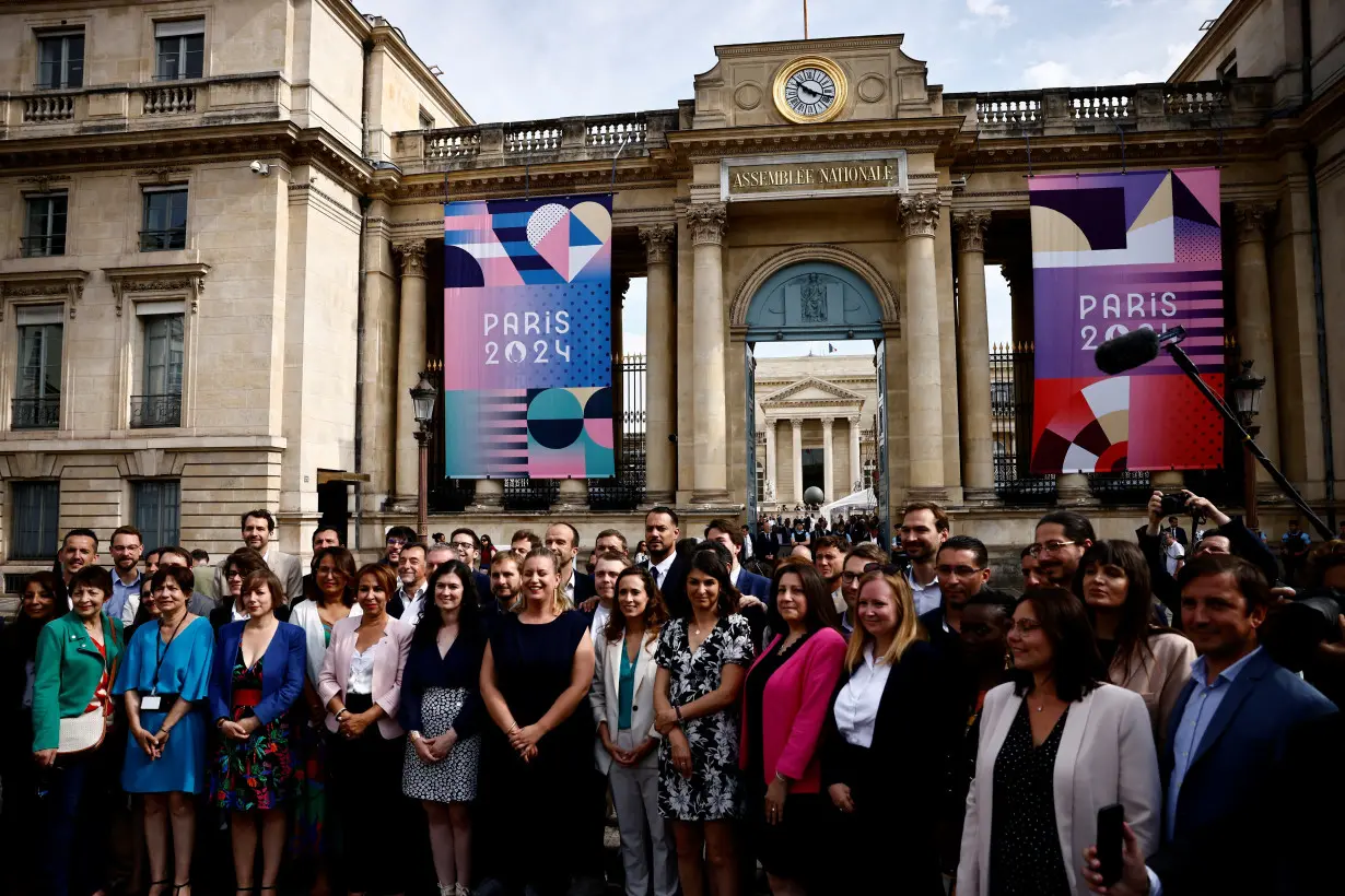 Newly-elected lawmakers make entry to the National Assembly in Paris