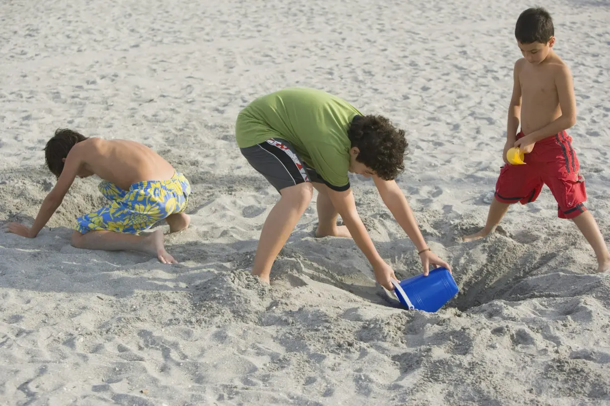 Dig safely when building sandcastles and tunnels this summer – collapsing sand holes can cause suffocation and even death