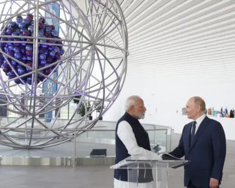 Russia talks up business with India as Modi visits Moscow