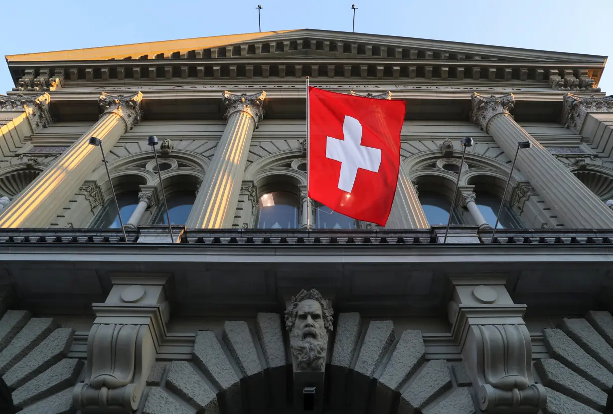 Switzerland's national flag flies at the Swiss Federal Palace in Bern