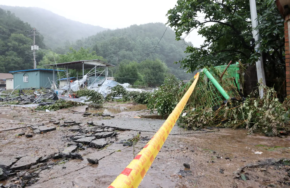 Rains pound South Korea causing landslides, bullet trains slowed