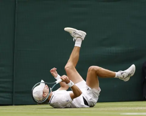 Tennis-Injured De Minaur pulls out of Djokovic quarter-final