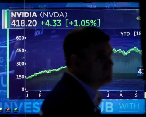 Nvidia leads Nasdaq and S&P 500 to record highs