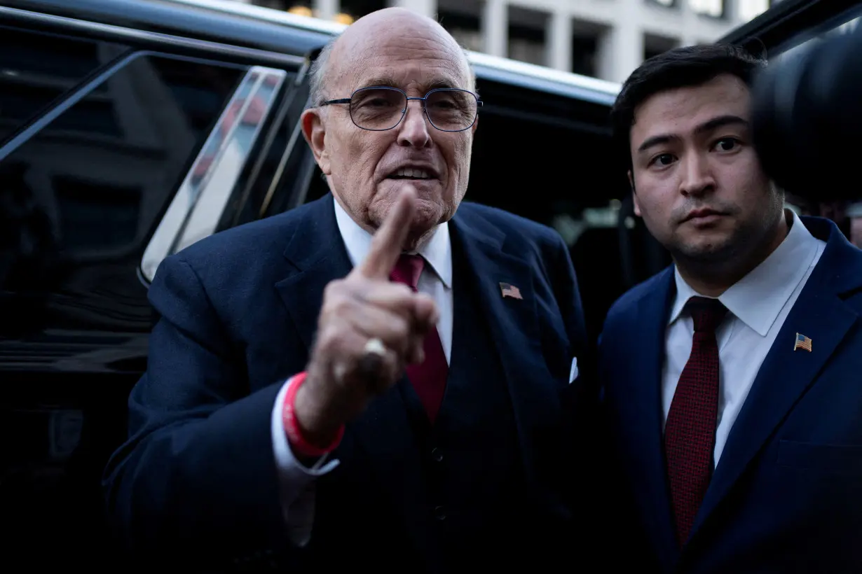 FILE PHOTO: Former New York Mayor Rudy Giuliani departs defamation lawsuit at the District Courthouse in Washington