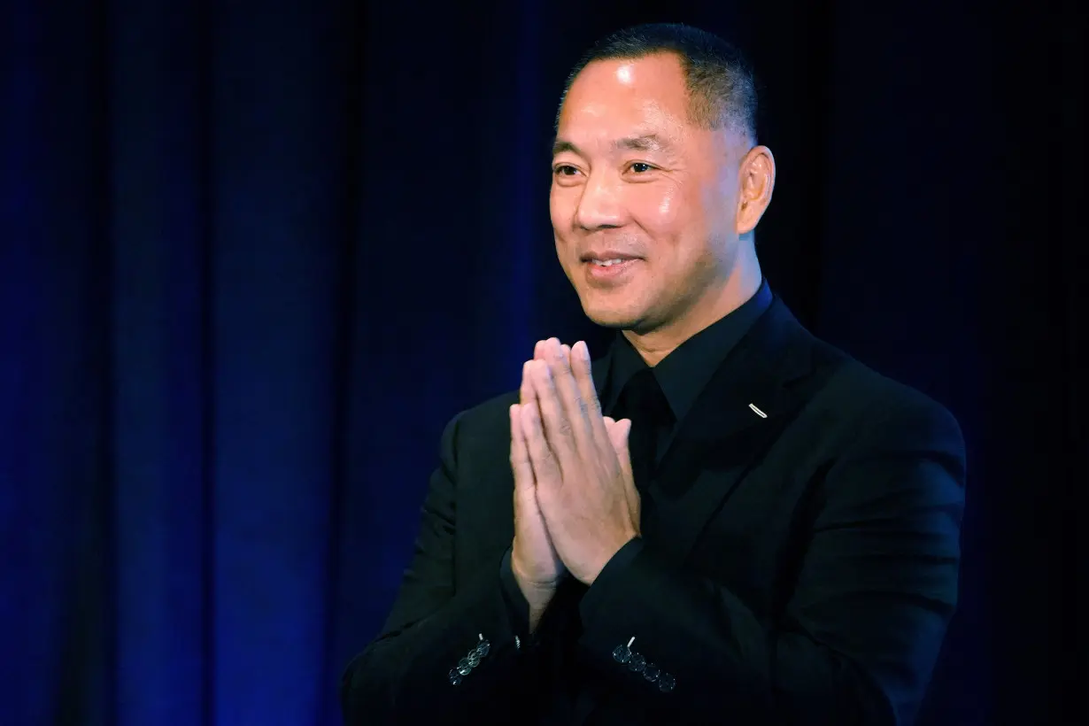 FILE PHOTO: Guo Wengui (also known as Miles Kwok) holds a news conference with Steve Bannon in New York