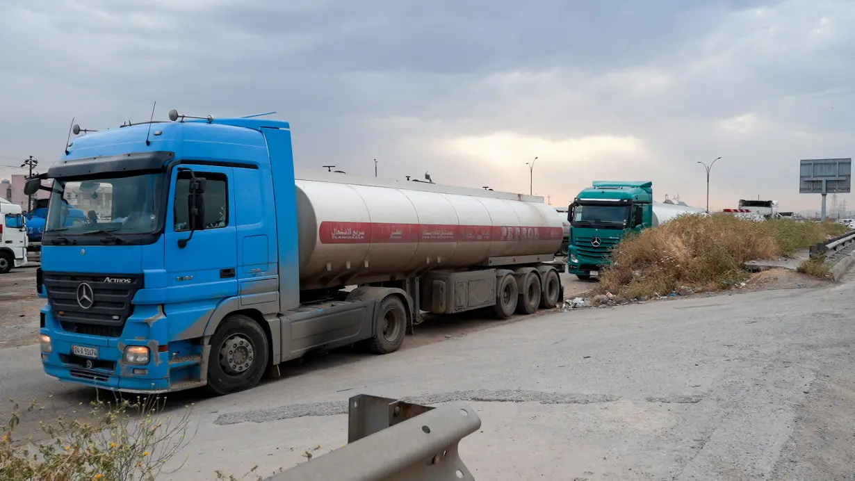 Oil tankers are pictured near the Iraqi border with Turkey, on the outskirts of Duhok province