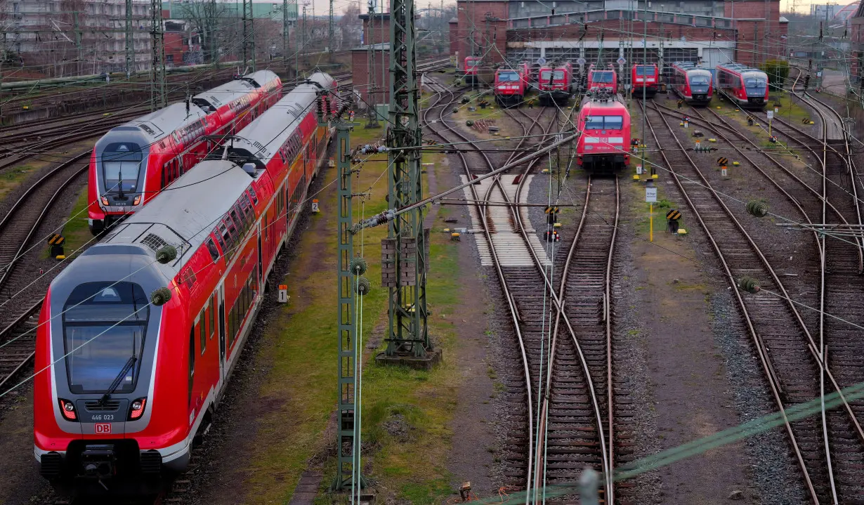 FILE PHOTO: Deutsche Bahn trains operate outside Frankfurt central station at the start of a strike by train drivers' union GDL