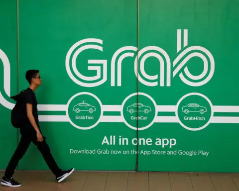 Grab's deal to buy Trans-cab could reduce competition, Singapore regulator says