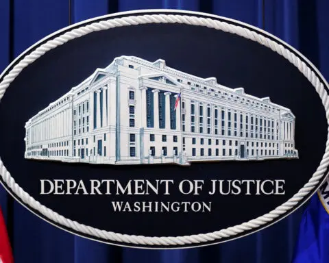 Kansas researcher wins reversal of conviction in Trump-era China probe