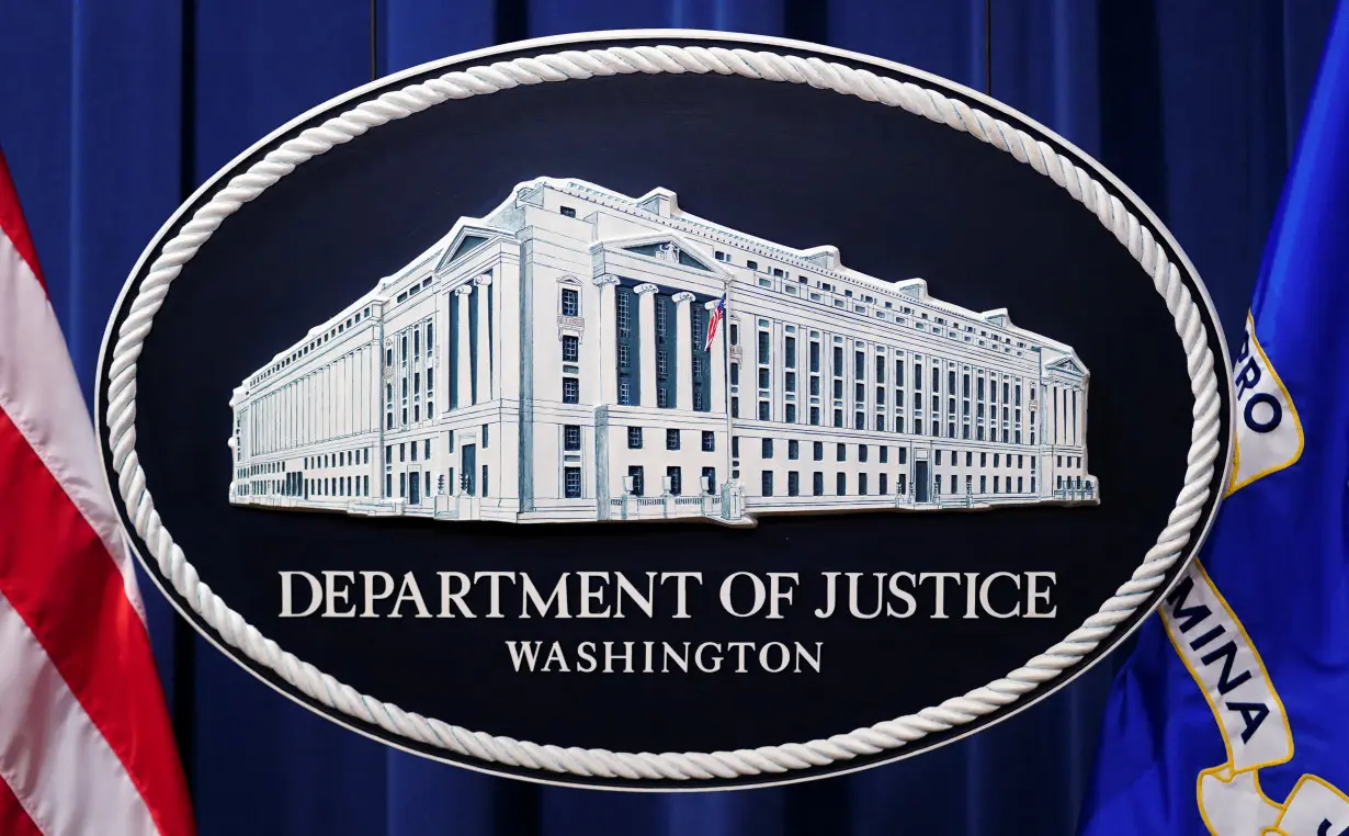 FILE PHOTO: U.S. Justice Department logo is seen at Justice Department headquarters in Washington