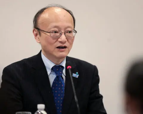 Japan steps up yen warnings, data suggest intervention