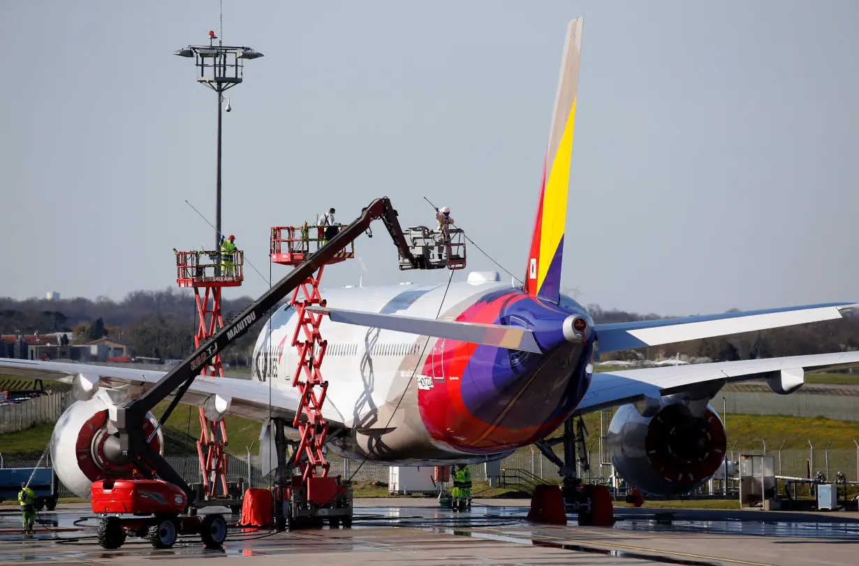 An Asiana Airlines Airbus A350-900 is seen at the Airbus delivery center in Colomiers near Toulouse