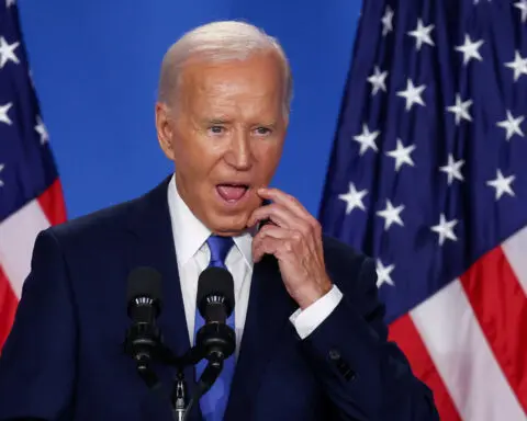 Biden mixes Harris with Trump, insists he is staying in the presidential race