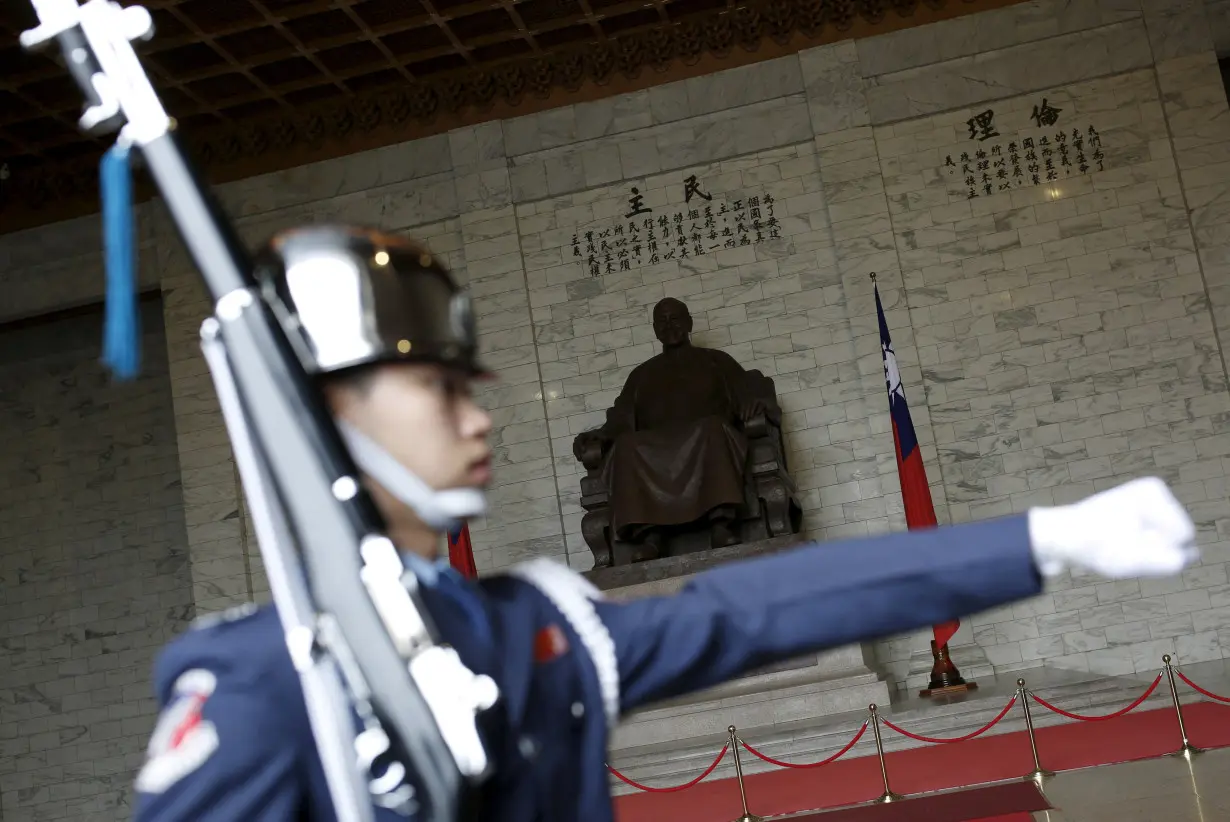 FILE PHOTO: FILE PHOTO: A military honor guard parade at the Chiang Kai-shek Memorial Hall in Taipei, Taiwan