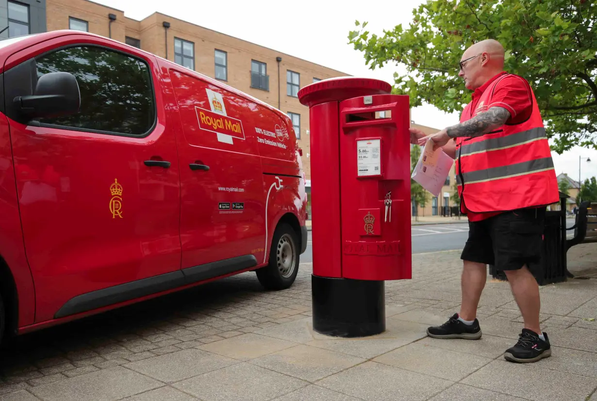 First postbox bearing the cypher of Britain's King Charles is installed in Great Cambourne