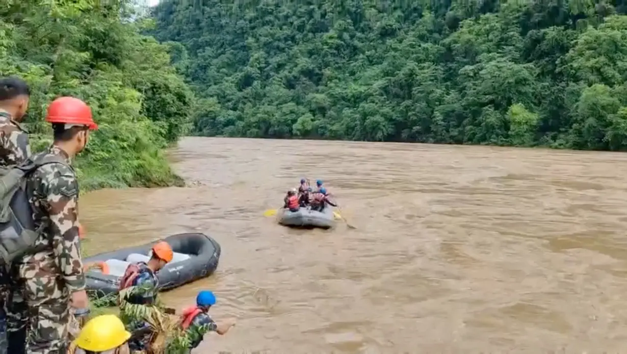 Rescue operation in the aftermath of a landslide at a location given as Chitwan District