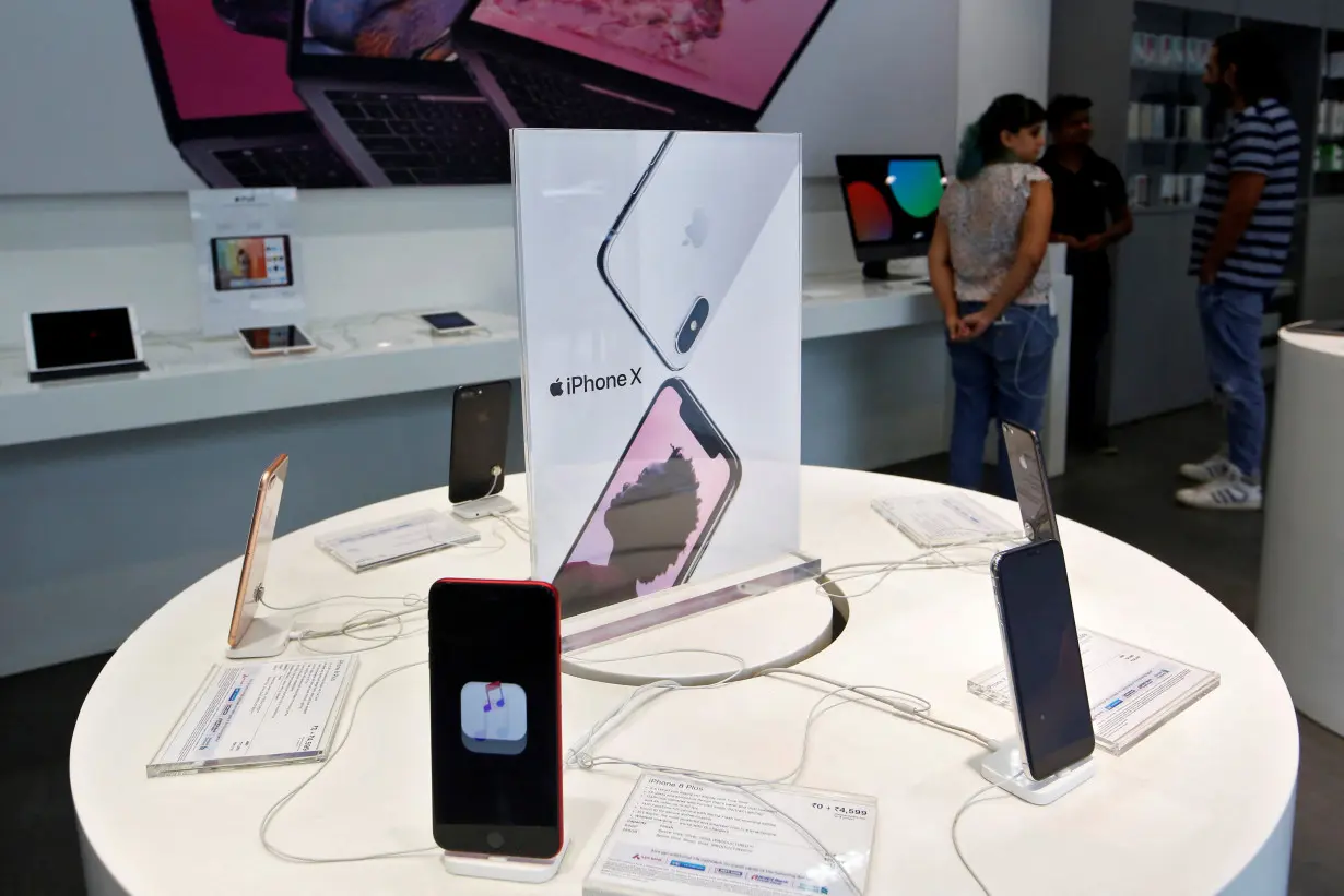 FILE PHOTO: Apple iPhone X mobile phones are seen at an Apple reseller store in Mumbai