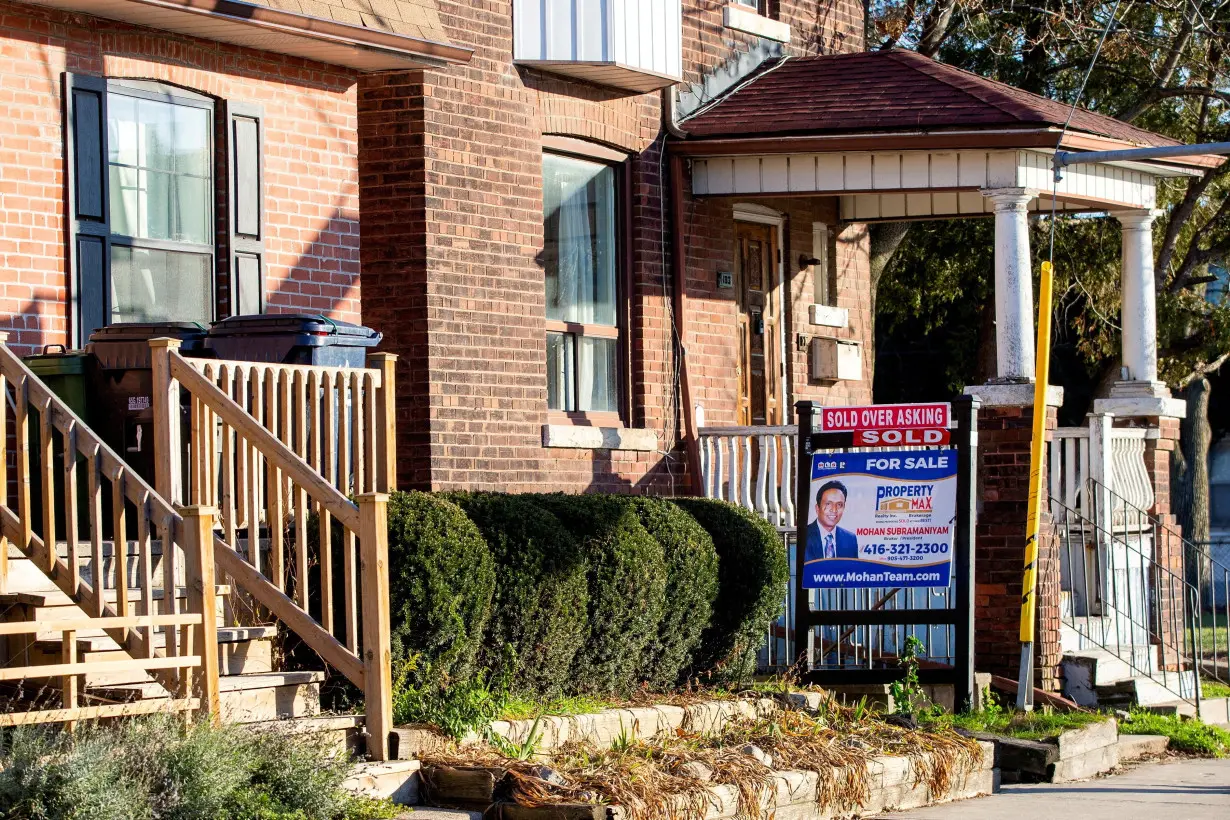 FILE PHOTO: Real estate signs in Toronto