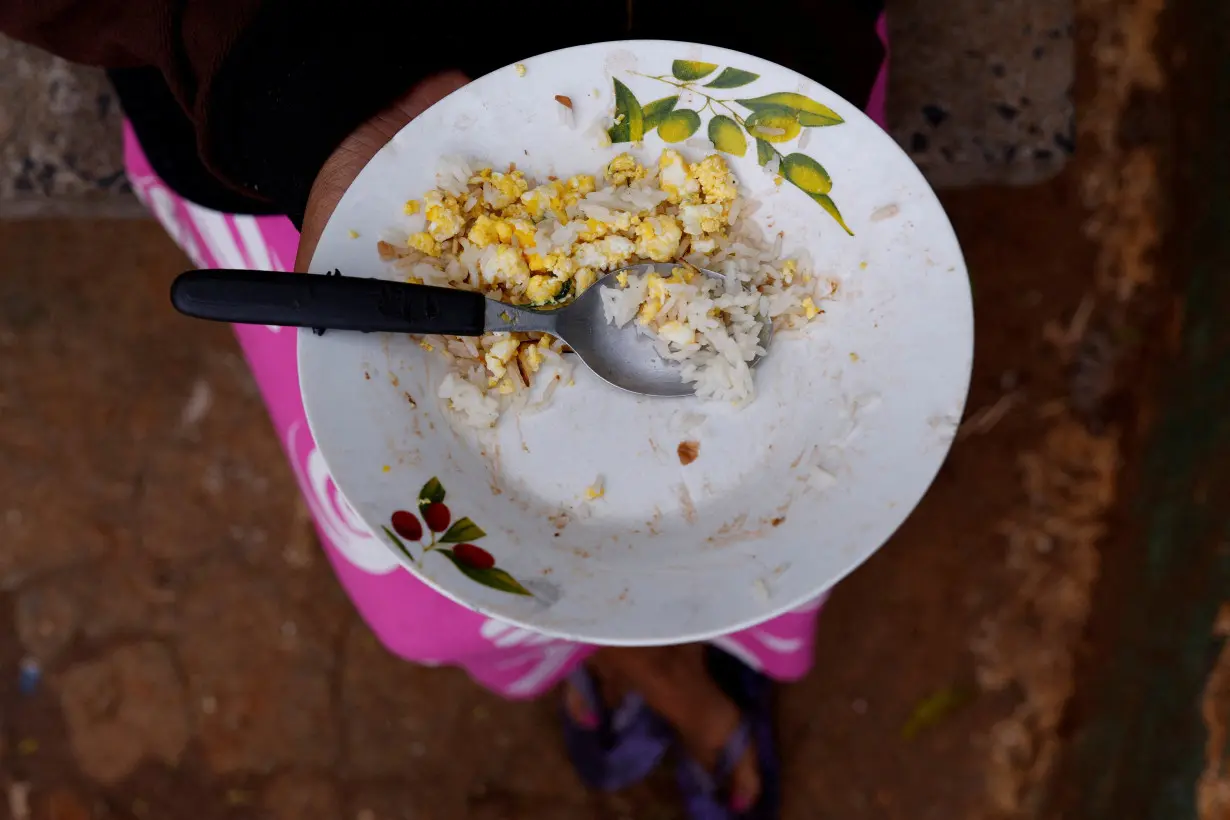 FILE PHOTO: A pregnant mother struggles to feed her family as grocery bills soar in Brazil