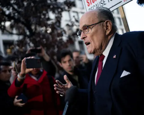 Judge ends Giuliani bankruptcy, heightening legal risks