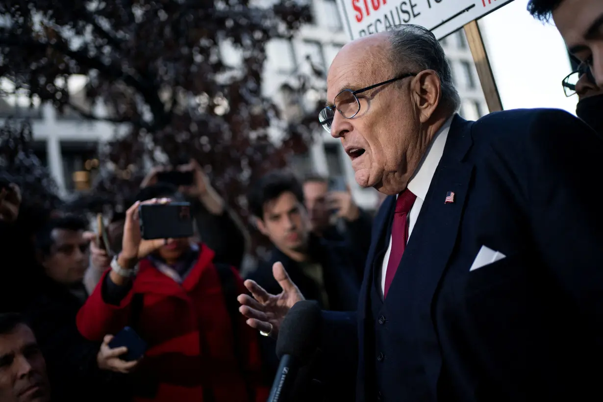 Former New York Mayor Rudy Giuliani departs defamation lawsuit at the District Courthouse in Washington