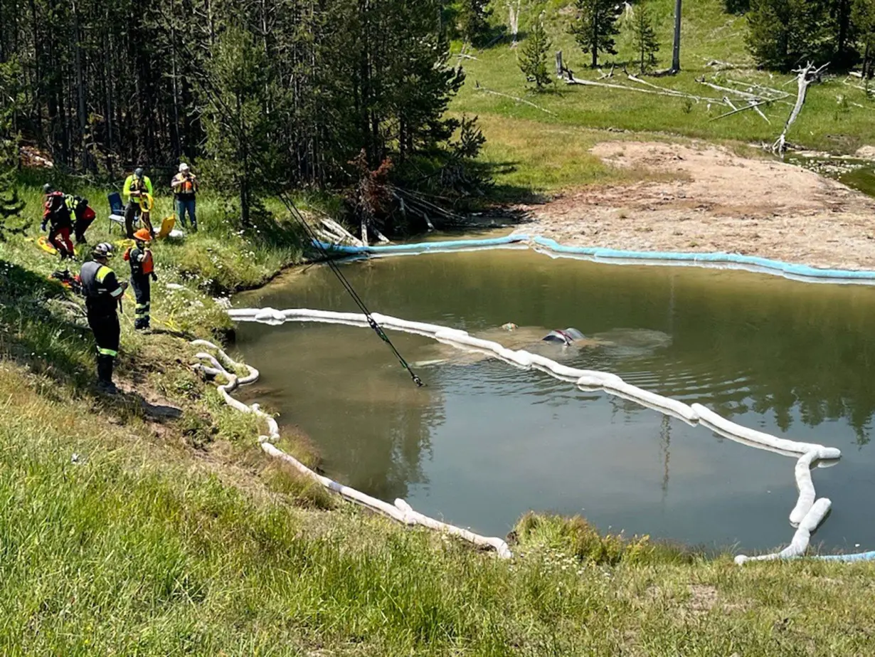 Car carrying 5 people runs off the road and into a hot geyser in Yellowstone