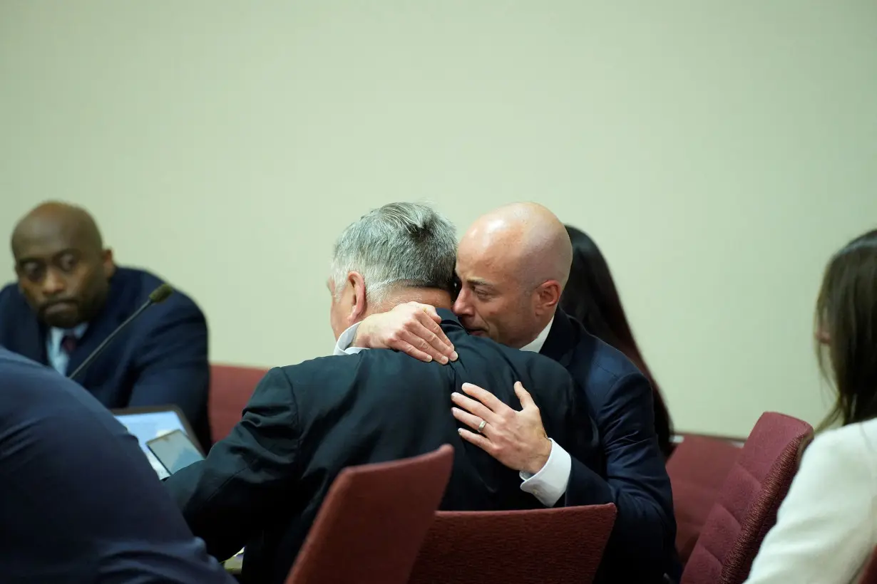 Attorney Luke Nikas embraces actor Alec Baldwin during his trial on involuntary manslaughter at Santa Fe County District Court in Santa Fe, New Mexico, on July 12.