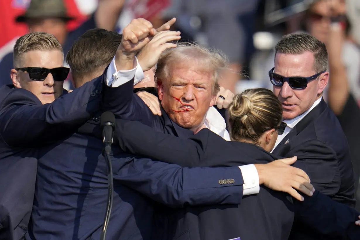 Trump’s raised fist is a go-to gesture with a long history of different meanings