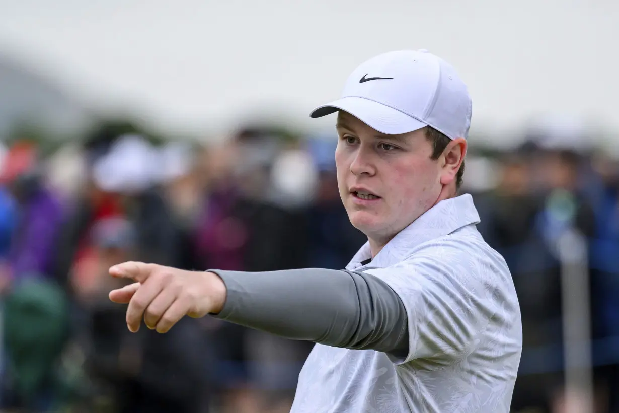 MacIntyre wins his national open in Scotland with birdie to beat Adam Scott